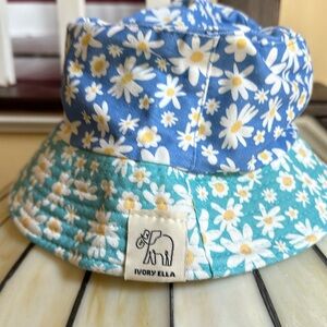 Ivory Ella bucket hat with daisies.